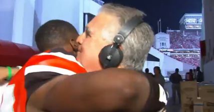 Video: Incredibly touching moment as entire football team hugs grieving reporter who lost his daughter