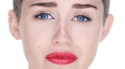 Picture: Miley Cyrus leaves little to the imagination in her Halloween costume