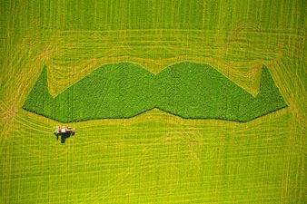 Pic: County Derry farmer brilliantly mows gigantic moustache into his field in aid of Movember