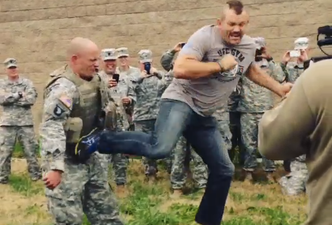 Video: U.S. soldier willingly takes a spinning back kick from Chuck Liddell