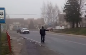 Video: Belarusian driver throws drunken hitchhiker over a barrier