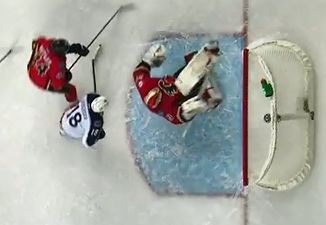 Video: Ice-hockey goalie makes unbelievable bicycle-kick save
