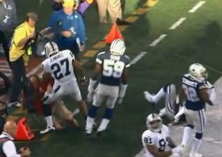 Video: Cameraman yells “F**k, aw f**k” after being taken out of it during Cowboys v Raiders game