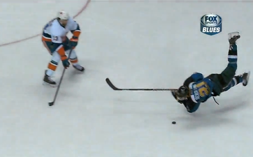 Video: Ice hockey player falls flat on his face after mistimed slap shot