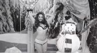 Video: Kelly Brook singing Santa Baby in next to nothing