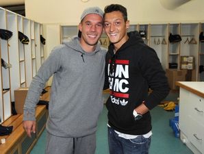 ‘G’wan Munster’. Podolski, Ozil and Cazorla are supporting the men in red this weekend