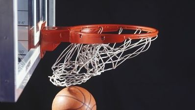 Video: High school basketball player scores incredible behind the back shot