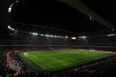 Arsenal fans shine a light on the Emirates Stadium after floodlights go out