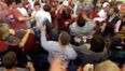 Video: Female fan goes absolutely berserk at college football game, attacking other supporters