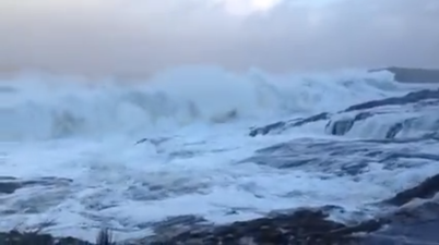 Video: Cork men capture close call on camera after wave knocks them off their feet