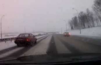 Video: Impatient driver pays the price on icy road