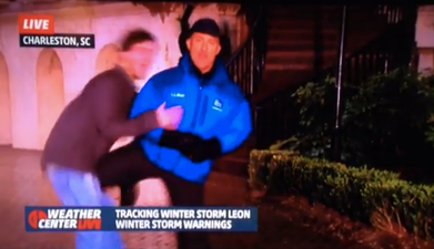 Video: Weatherman knees a college kid in the crotch for interrupting his shot