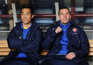 GIF: Lukas Podolski was not at all happy that he didn’t get off the bench last night