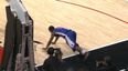 Video: Basketball player struggles to get to his feet on ridiculously slippy court