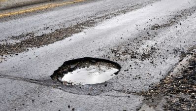 Pic: Storm creates Ireland’s biggest pothole in Mayo
