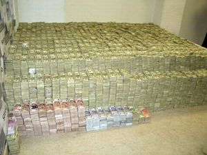 Pics: This pile of cash, worth $22bn, was found inside the insane home of a Mexican drug lord