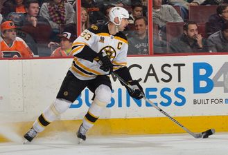 Winter Olympics pic: Tiny figure skater meets giant ice skater