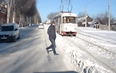Video: Russian man barely escapes collision with tram