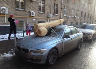 What a dick: Putin supporters strap giant wooden penis to Russian satirist’s car