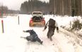 Video: Rally driver drags a helpful spectator to the ground