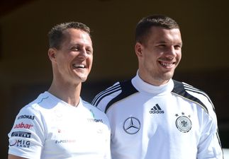 Picture: Das Boot! Lukas Podolski shows off Schumacher tribute footwear
