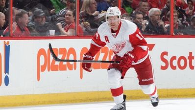 Video: Ice Hockey player gets teeth knocked out, picks them up, hands them to bench and plays on