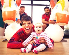Pic of the day: Donncha grounds the baby while the rugby ball sleeps in its cot…