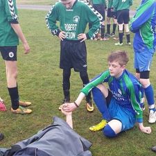‘True sportsmanship’ pic of the day: Injured player comforted by youngster from opposing team