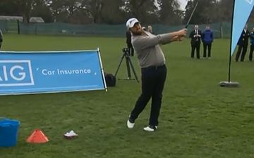 Video: Shane Lowry pings a beauty of a golf shot off a set of goalposts from the halfway line