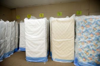 Video: Cyclist is knocked from his bike by mattress and then lands on it