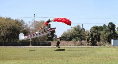 GIF: Extraordinary mid-air collision as skydiver is hit by plane and survives