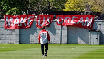 Pics: Liverpool fans turned up to training today with these brilliant banners