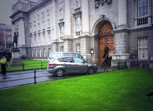 Car smashes into the front door of Trinity College in Dublin