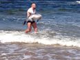 Pic of the day: Cathal Pendred saves a stricken dolphin in Doonbeg