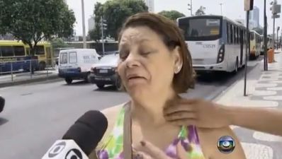 Video: Thief attempts to rob woman on the street in Rio as she is interviewed about street crime in Rio