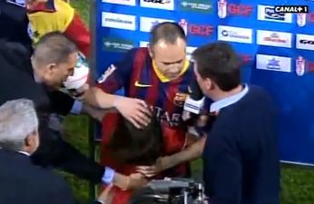 Video: A little girl gave Andres Iniesta a hug during his post-match interview last night… and just wouldn’t let him go