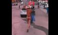 Video: Husband catches his wife in the act with another man and chases naked cheater down the street