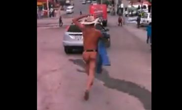 Video: Husband catches his wife in the act with another man and chases naked cheater down the street