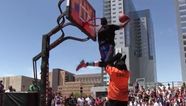 Video: Check out this amazing between-the-legs slam from a dunk contest this weekend