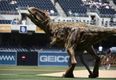 Video: Watch as a T-Rex ‘throws’ the first pitch at this baseball game