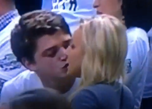 Gif: Man’s kiss attempt gets rejected during basketball game