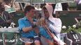 Video: Novak Djokovic chills with ball boy during rain delay