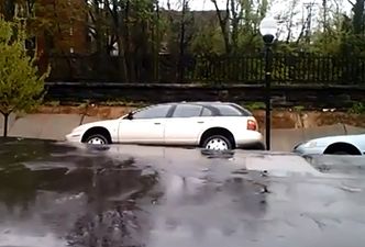 Video: Incredible footage of cars being swallowed in a landslide in Baltimore