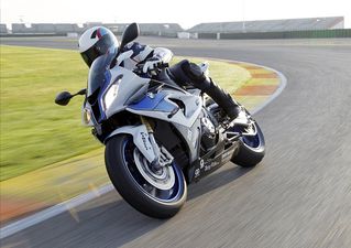 Video: Flippin’ heck! Motorcyclist amazingly lands on his feet after being hit by a car and somersaulting into the air