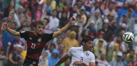 Chicago Town Take Away Slice of the Action: Thomas Muller lashes home a beaut for Germany