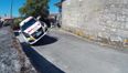 Video: The closest of close calls as this rally car goes up on two wheels around a corner