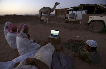 Sitting back, watching the football, relaxing, Saudi-style