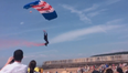 Video: Shocking scenes as RAF parachutist smashes into burger van during air display