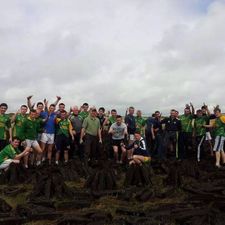 Pics: A bus full of players from a Donegal club team spotted a farmer turning turf alone in Galway so they all got out and gave him a hand