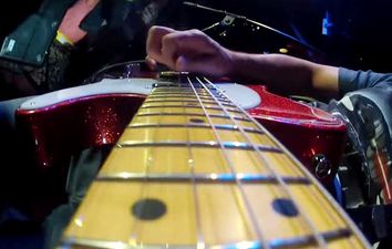 Video: Guitarist steals fan’s GoPro camera and uses it to play incredible slide solo